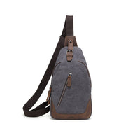 canvas sling bag with leather trim
